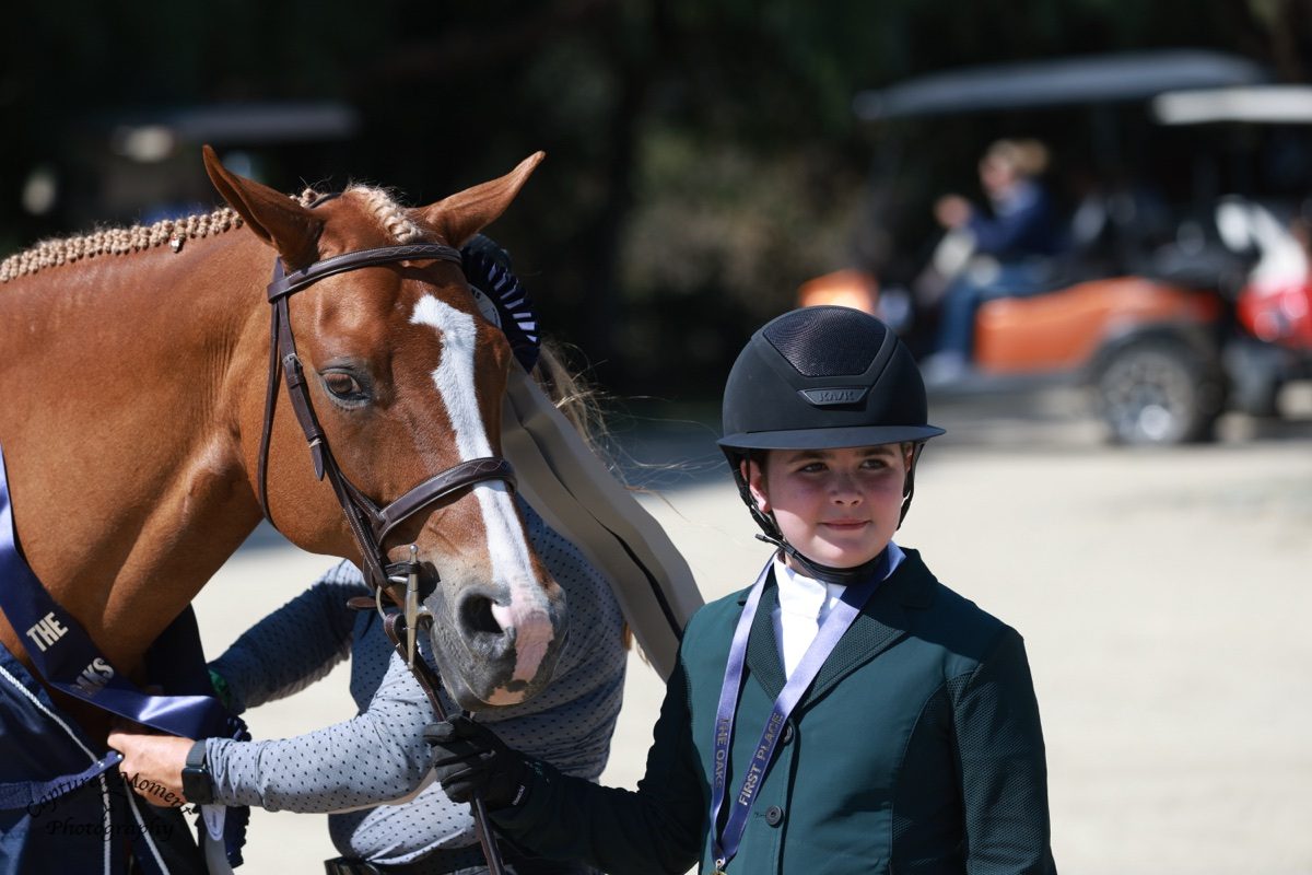 Kate and Honey after winning the Short Stirrup Hunter 2' Classic at The Oaks Summer 2, 2026